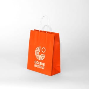 Kleine orange Papiertasche mit Kordel